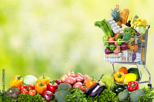 Fototapeta Naklejka Na Ścianę i Meble -  Shopping cart with vegetables and fruits.