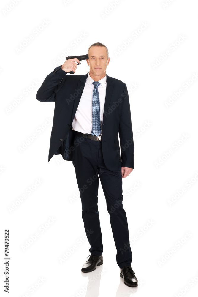 Mafia man with handgun near head Mafia man with handgun near head