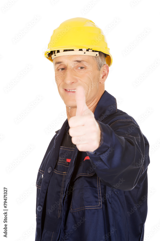 Repairman showing thumbs up