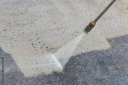Outdoor floor cleaning with high pressure water jet
