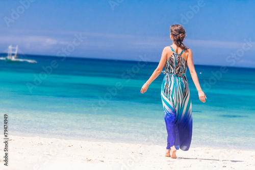 young happy woman on tropical sand beach