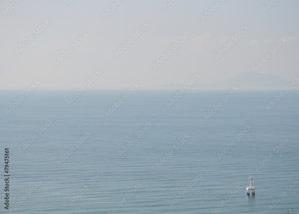 buoy floating on the vast sea