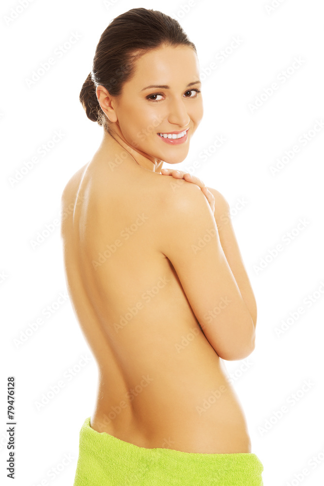 Fototapeta premium Nude woman touching shoulder