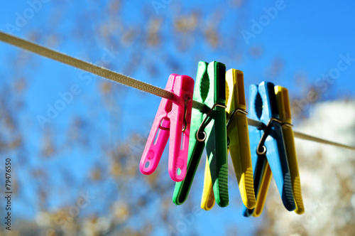 colorful clothespin hanging on rope with socks