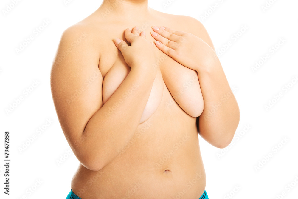 Fototapeta premium Overweight woman covering her breast