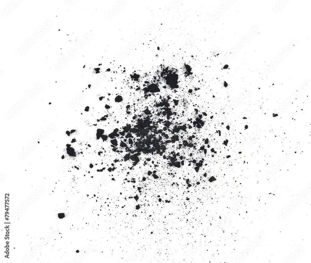 particles of charcoal on a white background