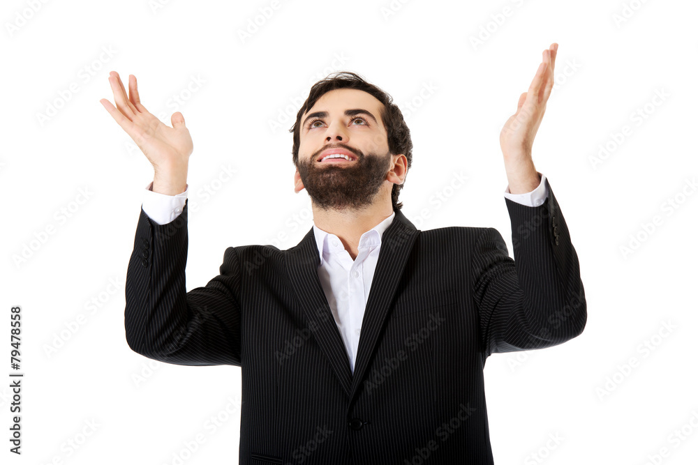 Businessman showing empty copyspace in hands. Businessman showing empty copyspace in hands.