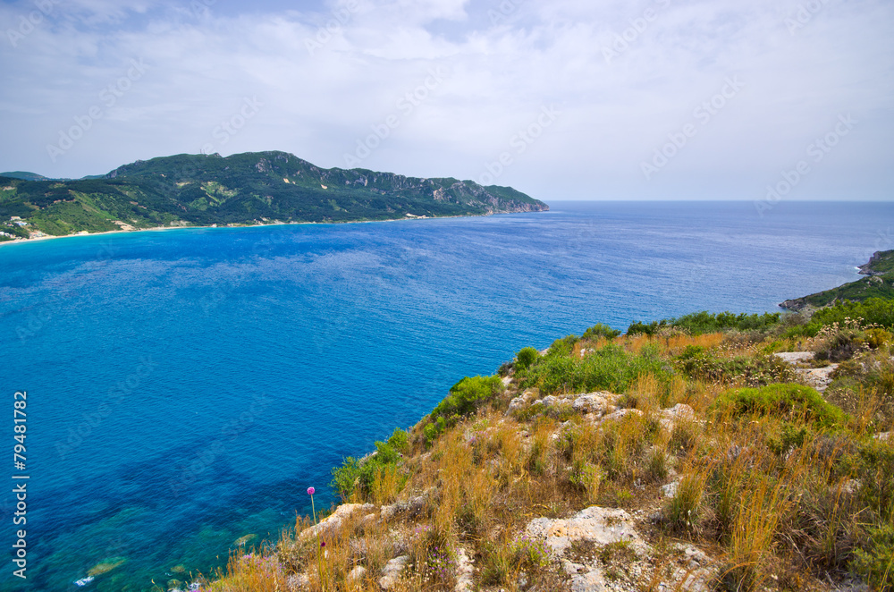Lagoon and high cliffs near Agios Georgios, Corfu, Greece