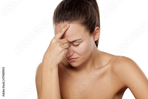young woman with a headache