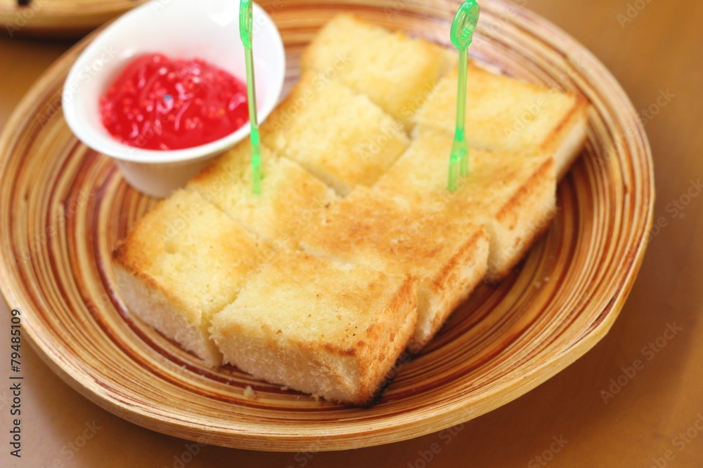 Bread, butter and strawberry jam