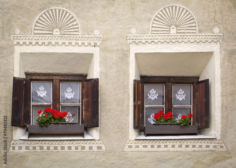 Two windows at an old building