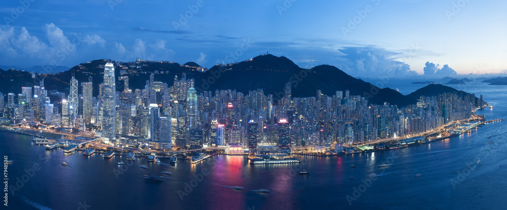 Naklejka premium Aerial view of Hong Kong City at dusk