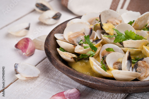 Fresh Cockle clams (Venus, Meretrix) with wine sauce. Portuguese photo