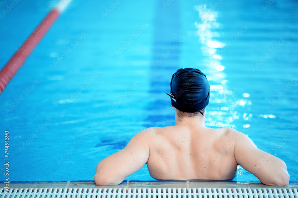 Young man in swimming pool