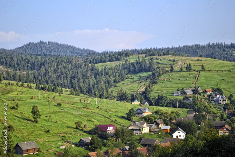 Landscape with mountains on the panorama of the village