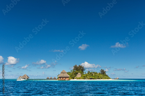 small tropical island with Beach Villas