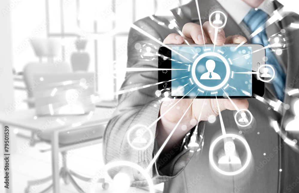 Fototapeta premium Business Hand holding a phone show the social network
