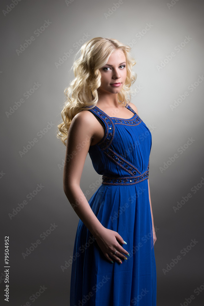 Cute model posing in dress for graduation ceremony Cute model posing in dress for graduation ceremony