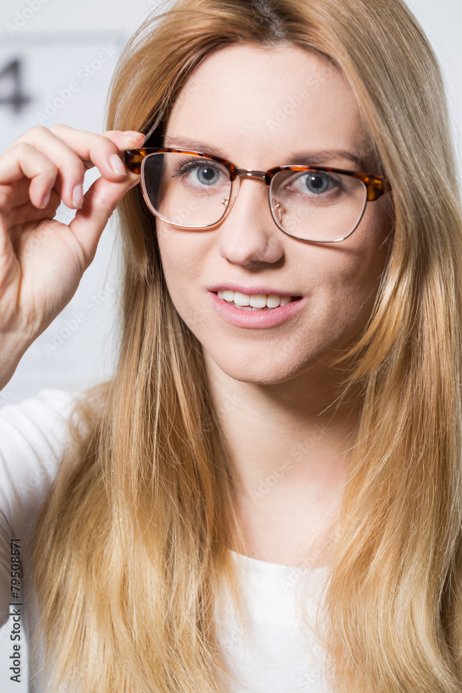 Woman with myopia wearing spectacles Woman with myopia wearing spectacles