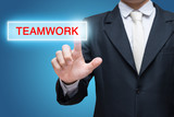 Businessman pressing teamwork button isolated