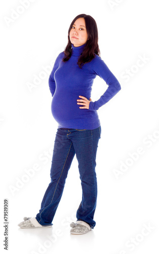 Pregnant asian woman isolated on white hands on hips