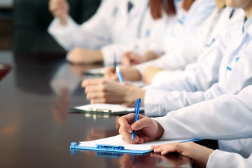 Medical workers working in conference room