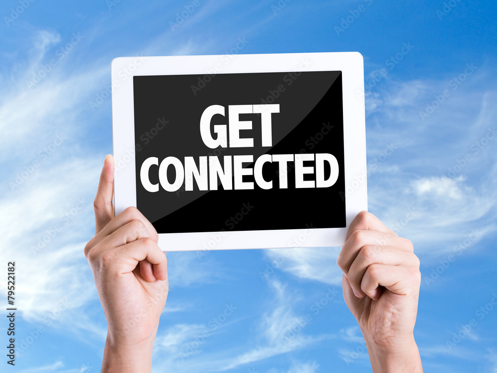 Tablet pc with text Get Connected with sky background Tablet pc with text Get Connected with sky background