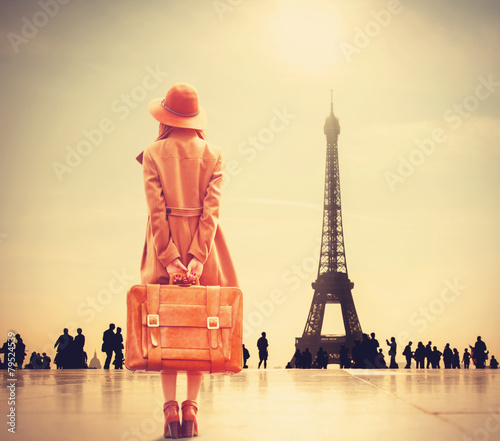 Redhead girl with suitcase © Masson
