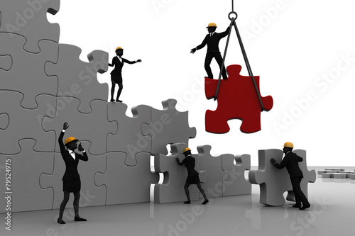 Fototapeta Naklejka Na Ścianę i Meble -  Team making jigsaw puzzle