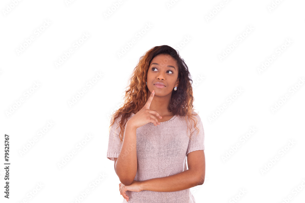 Portrait of a thoughtful young african american woman looking up Portrait of a thoughtful young african american woman looking up