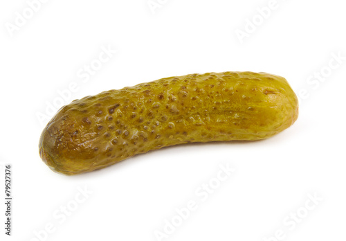 Single green pickle on white background