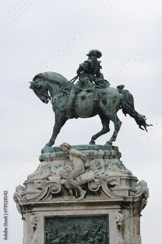 Old historical bronze statue of a warrior  riding a horse in Budapest