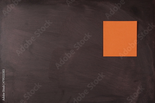 Blank Orange Note On Blackboard