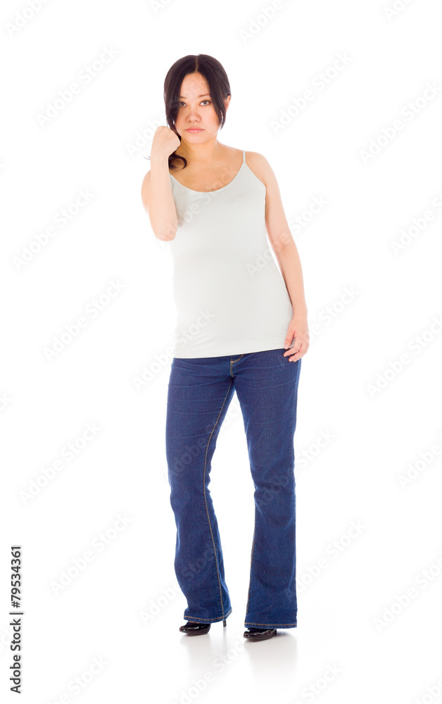 Pregnant asian woman isolated on white showing fist for strength Pregnant asian woman isolated on white showing fist for strength