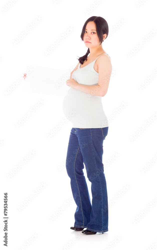 Pregnant asian woman isolated on white with sign Pregnant asian woman isolated on white with sign