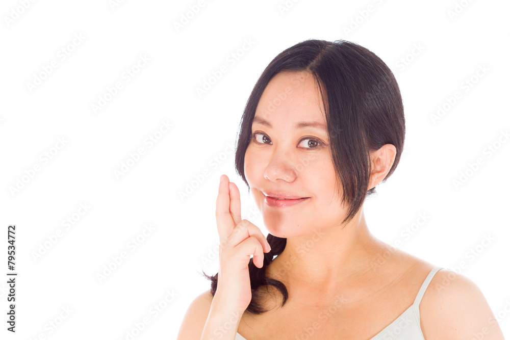 Pregnant asian woman isolated on white fingers crossed for luck Pregnant asian woman isolated on white fingers crossed for luck