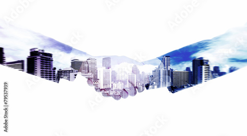Handshake and a city. Double exposure concept.