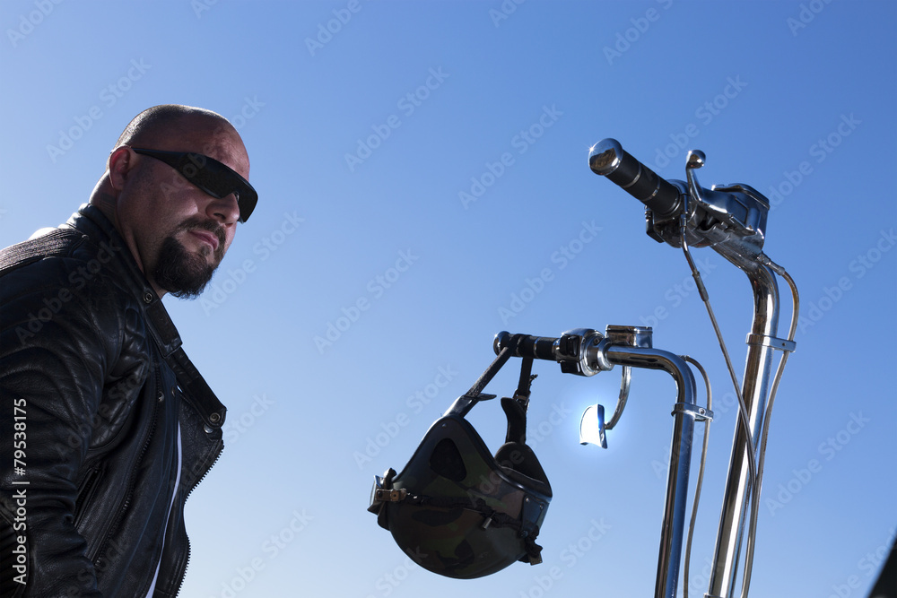 portrait of a chopper motorcyclist .