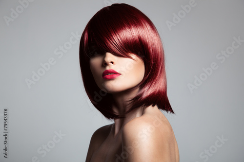 Canvas Print Beautiful red hair model with perfect glossy hair. Close-up port