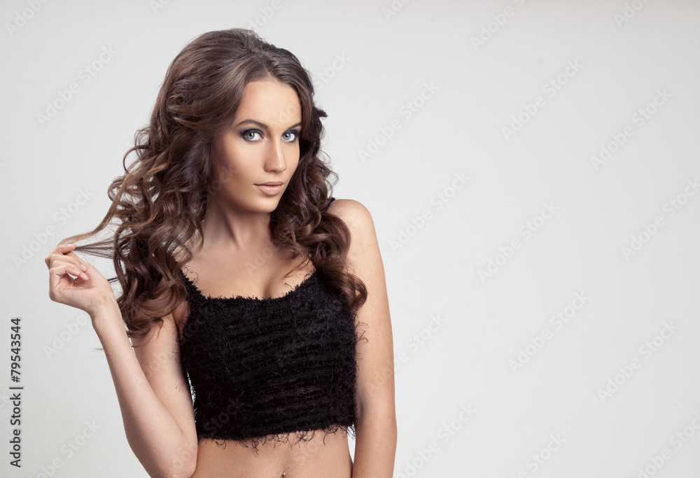 Beautiful Brunette Woman. Curly Long Hair. Beautiful Brunette Woman. Curly Long Hair.