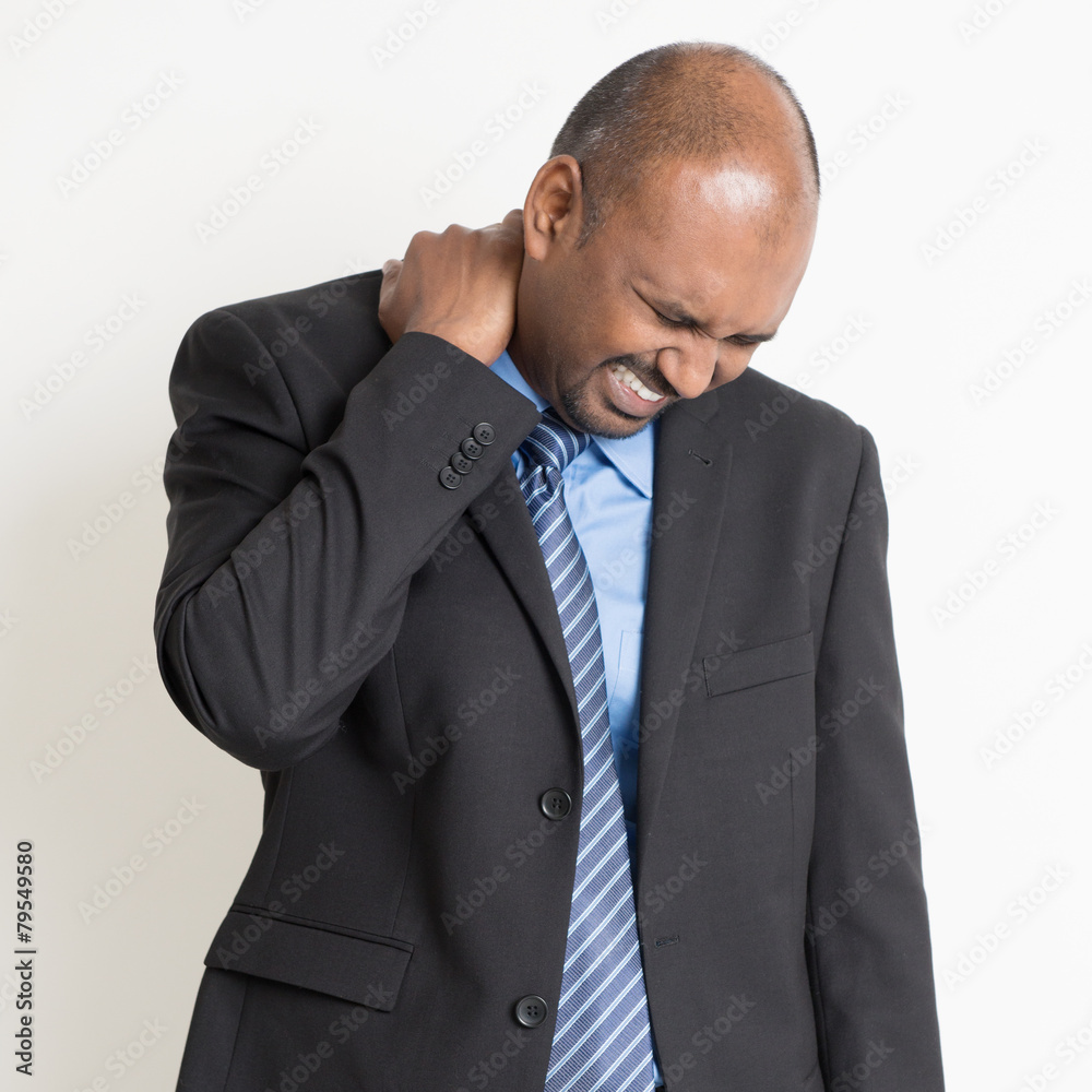 Indian businesspeople shoulder pain Indian businesspeople shoulder pain