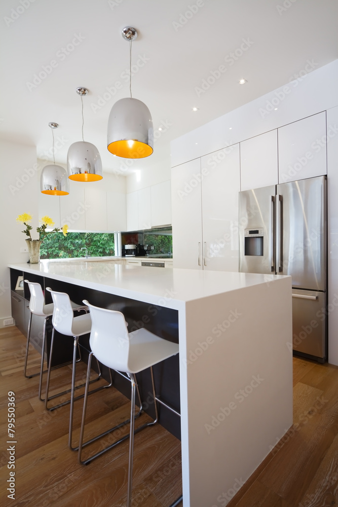 Modern Australian kitchen renovation with waterfall island bench Modern Australian kitchen renovation with waterfall island bench