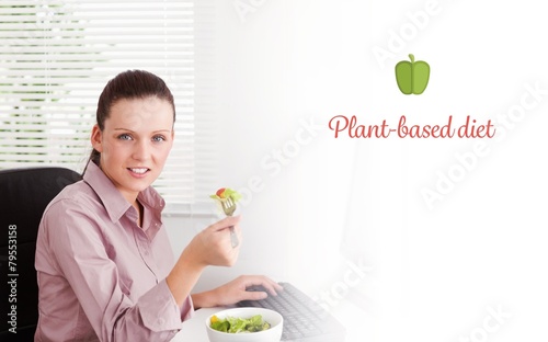 Plant-based diet against businesswoman eats salad