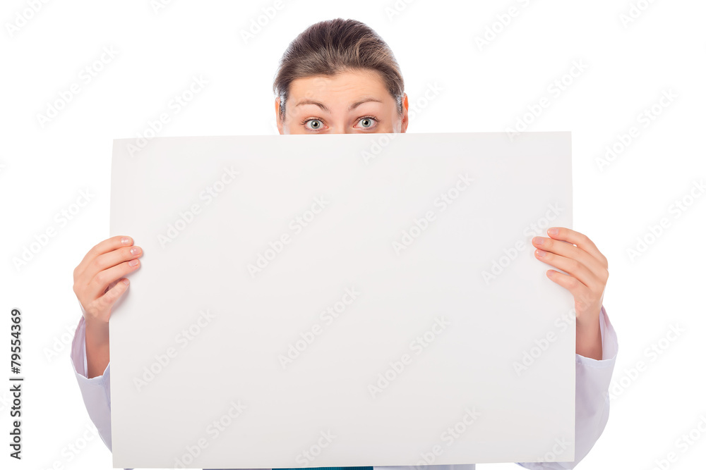 young brunette doctor and white poster on a white background young brunette doctor and white poster on a white background