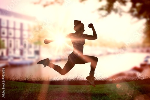 Composite image of fit brunette running and jumping