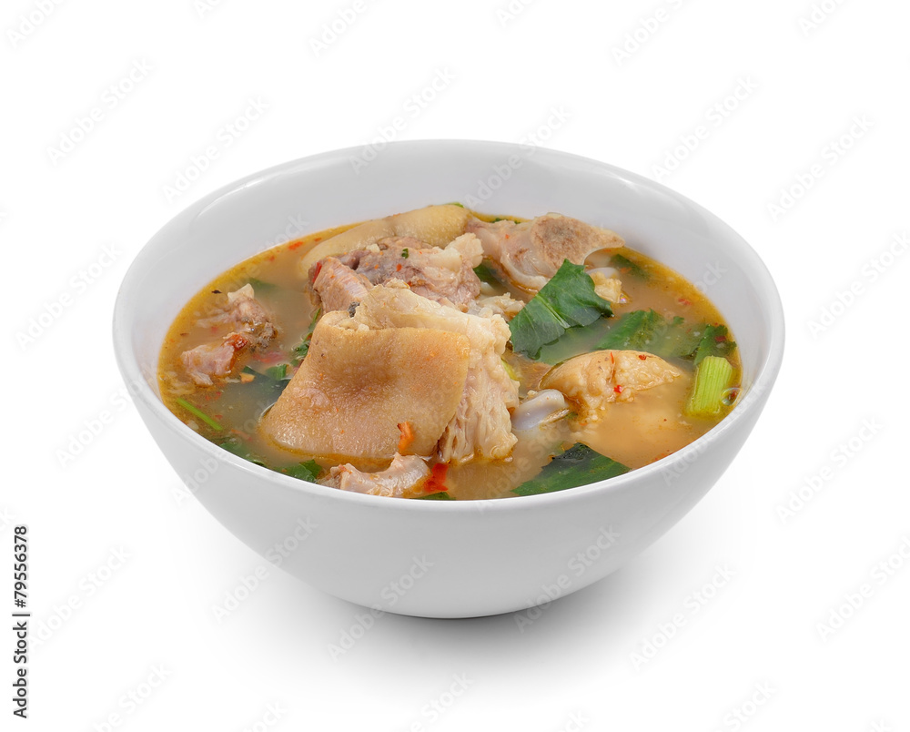 hot and spicy soup with pork isolated on white background