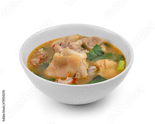 hot and spicy soup with pork isolated on white background