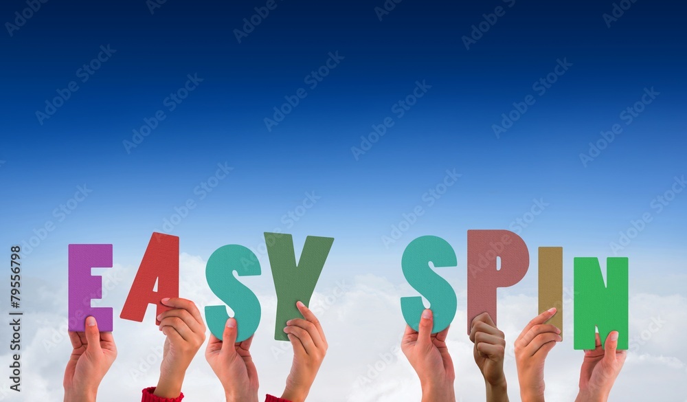 Composite image of hands holding up easy spin Composite image of hands holding up easy spin
