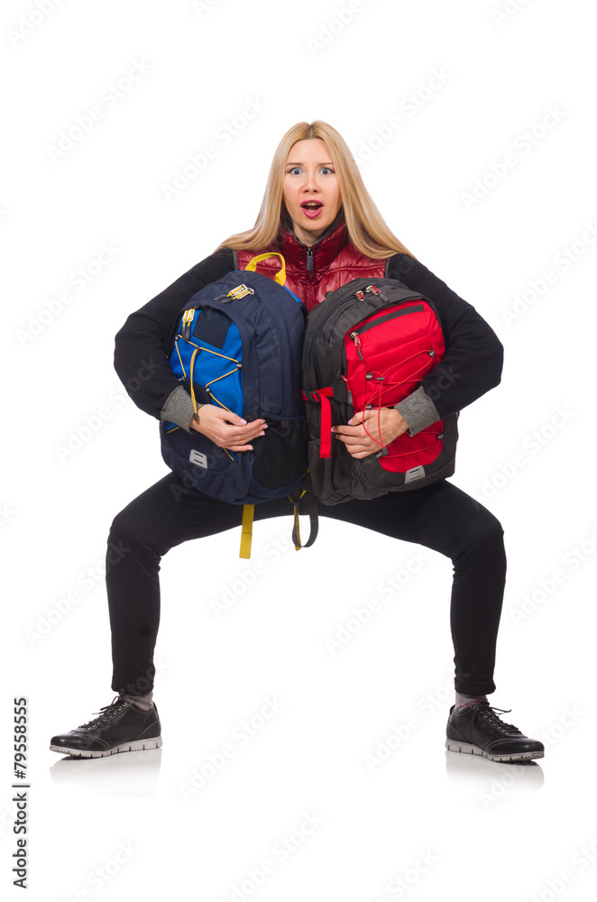 Fototapeta premium Young woman student with backpack isolated on white
