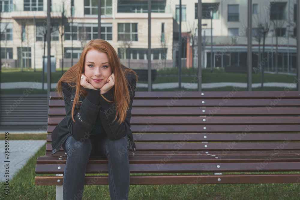 Beautiful girl posing in the city streets